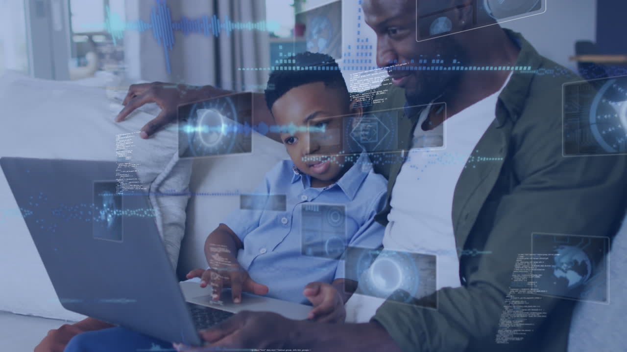 Animation of data processing against african american father and son using laptop together at home