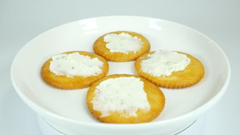 round crackers with herb cheese