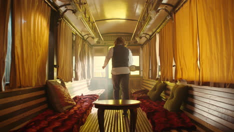 vintage train car interior with man
