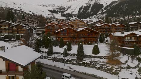 flying above the snow-capped village of verbier, switzerland