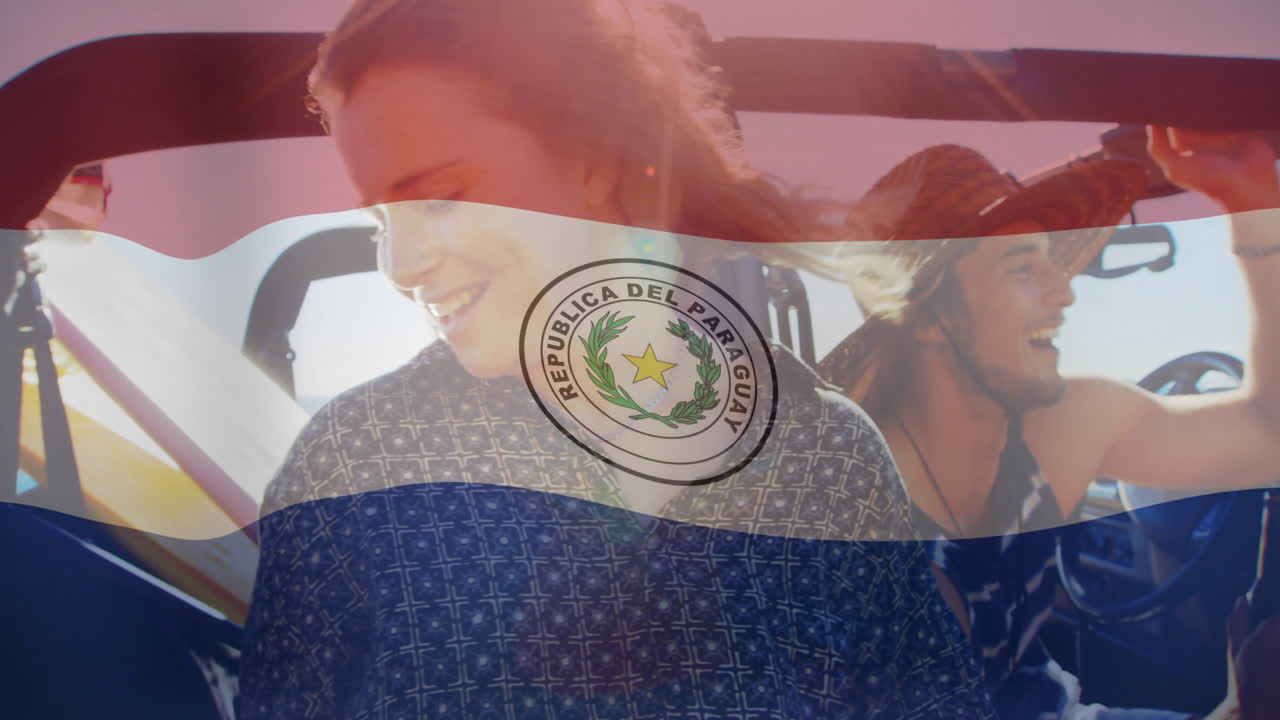 In car ride, young people waving Paraguay flag, creating animation effect