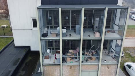 aerial of animal shelter building with cages full of cats