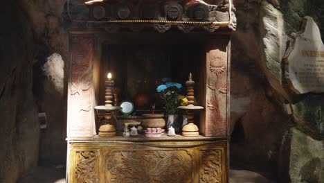 Buddhist-altar-inside-a-temple-at-Marble-Mountains-in-Da-Nang,-Vietnam