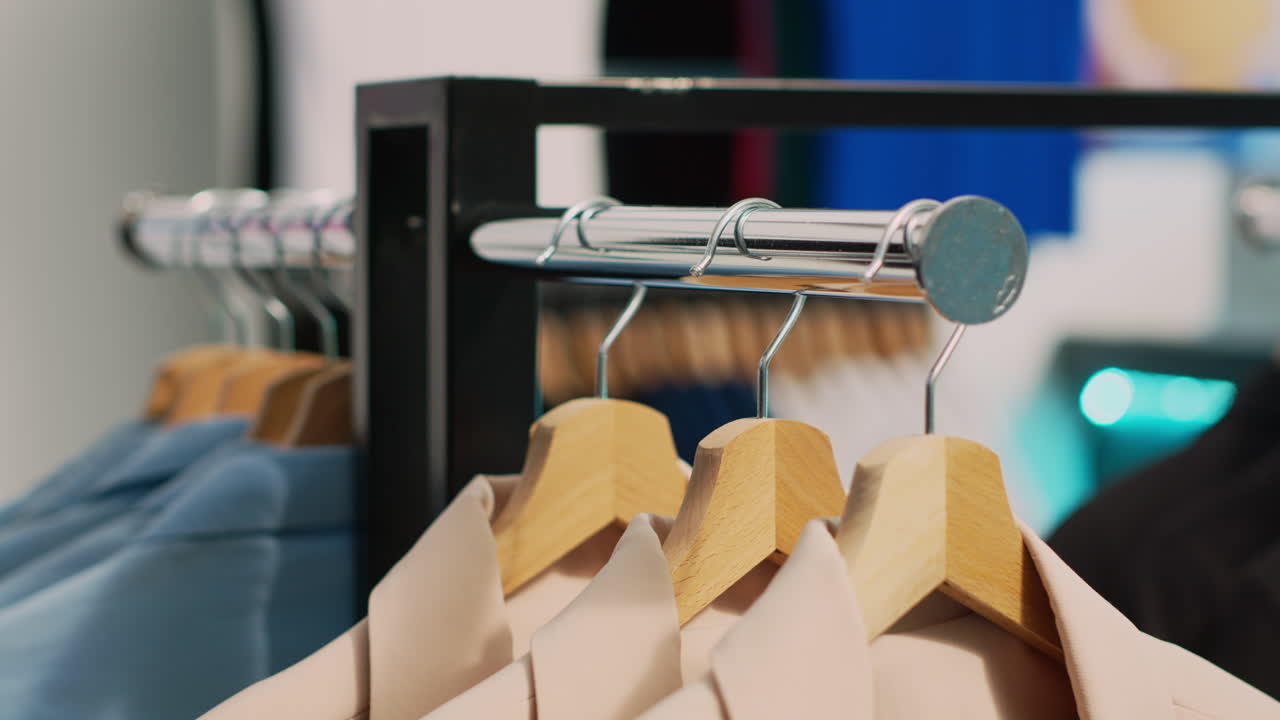 Clothes on Hangers in Retail Store