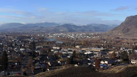 a bird's eye view of the cozy homes and tree-lined streets of kamloops