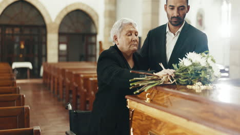 Flowers-on-coffin,-senior-mother