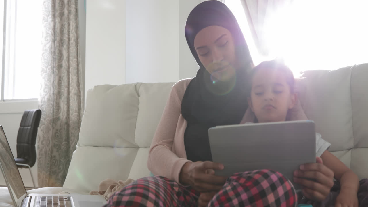 Mother and daughter at home