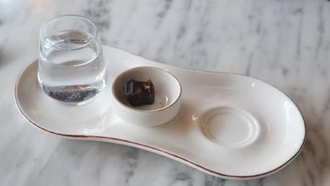 turkish coffee and chocolate on a white tray