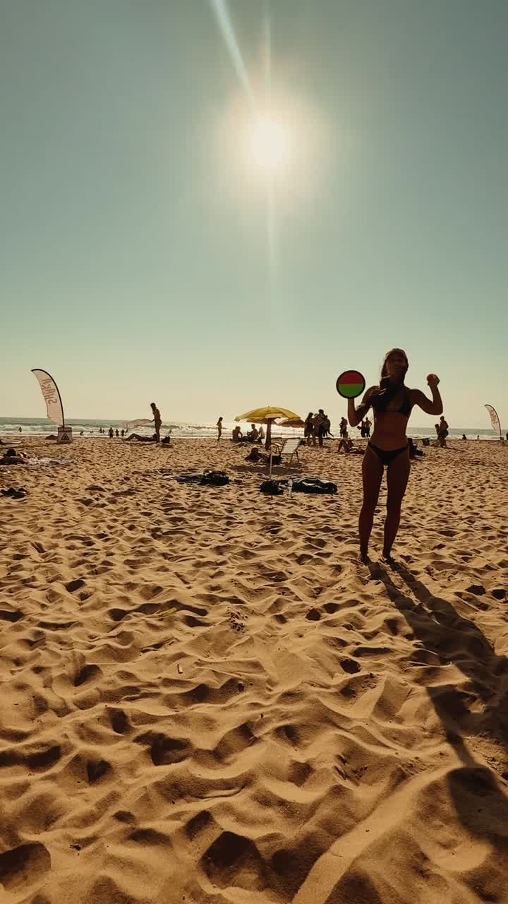 Beach scene with people enjoying the sun