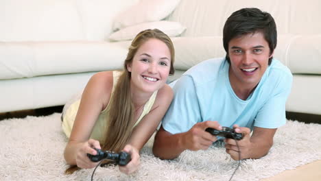 video of a couple playing video games