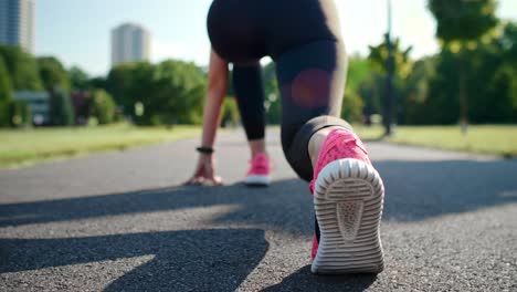 Handheld-video-of-woman-sprinting-in-the-park,-Katowice,-Poland