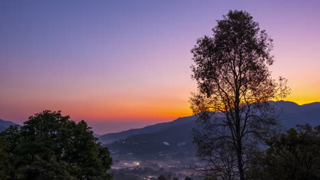 Sunrise-time-lapse-over-Panviman,-Thailand-on-a-clear-and-colorful-morning