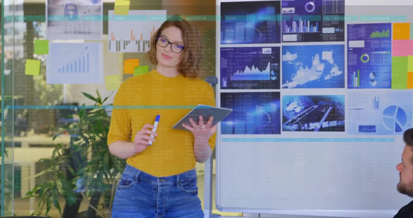 After glancing at laptop, presenter highlighting business charts on whiteboard, presenting insights