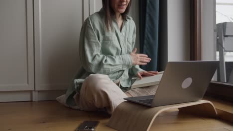 woman working remotely on a laptop