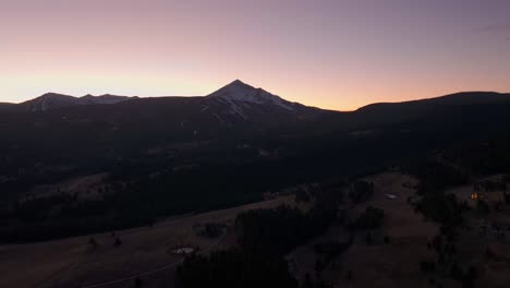 Distant-drone-shot-of-Lone-Mountain-in-Big-Sky,-Montana