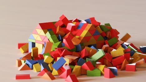 Colorful-wooden-block-tornado-whirl-going-ruthlessly-through-a-house.-Tough,-blocky-construction-stays-intact-despite-of-raw-natural-force-of-a-twister-made-out-of-cubes.-Closeup-shot-of-destruction.