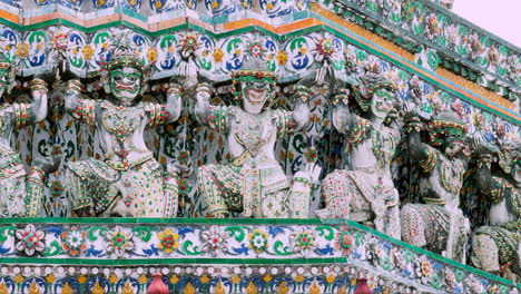 thai traditional literature ancient giant statue around the base and pagoda of wat arun