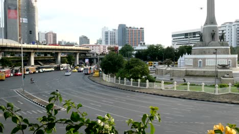 traffic at victory monument in bangkok, thailand.