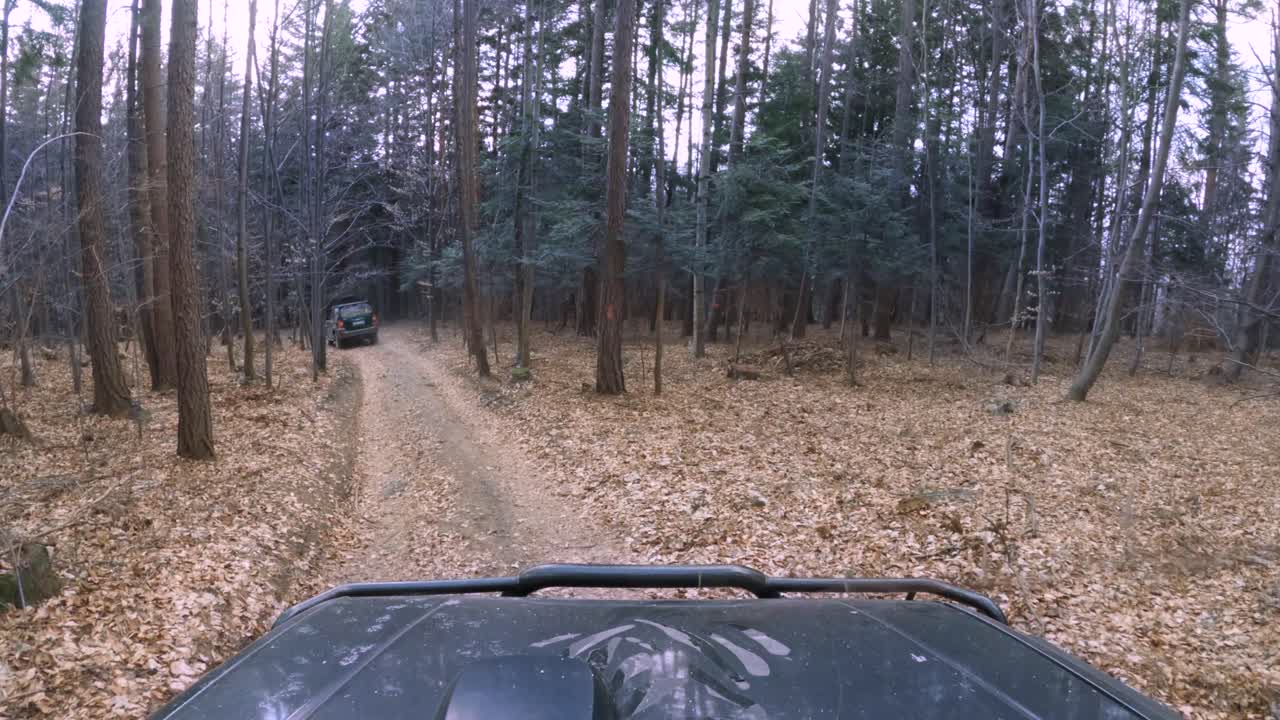 Mitshubishi Pajero off-roading in stunning autumn forest - GoPro 4k window view