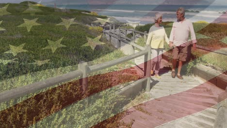 animación de una feliz pareja caucásica de alto nivel cogida de la mano en la playa, bandera de los estados unidos de américa