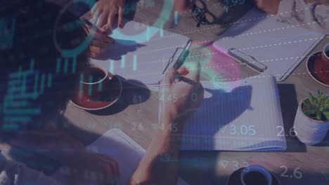 animation of stock market data processing over mid section of colleagues discussing over a clipboard
