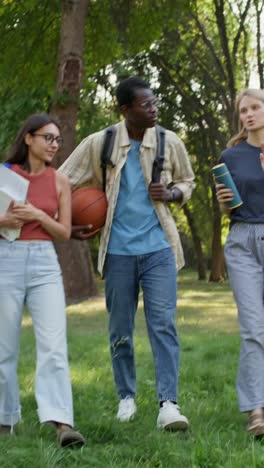 students relaxing in a park