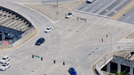 Cars-Driving-In-Slow-Motion-On-Road-Junction-In-Downtown-Atlanta,-Georgia