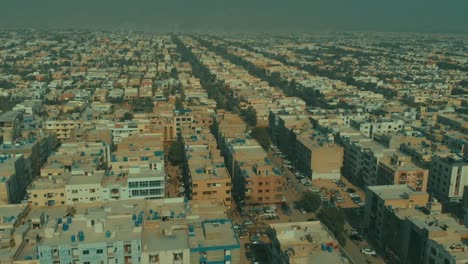 aerial over rooftops at dha defence karachi in pakistan. dolly parallax