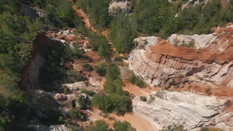 incredible drone footage of a group of people exploring a canyon