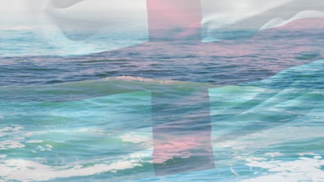 animación de la bandera de inglaterra soplando sobre las olas en el mar
