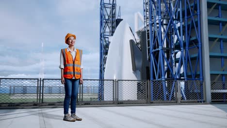 woman engineer at space rocket launch facility