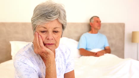 unhappy senior couple not talking after a fight