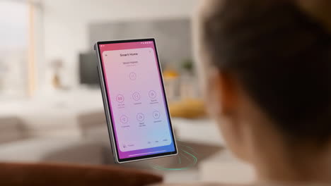 person interacting with a smart home application on a floating device