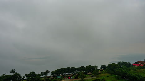 time lapse of fog and clouds rolling over taal volcano caldera in philippines