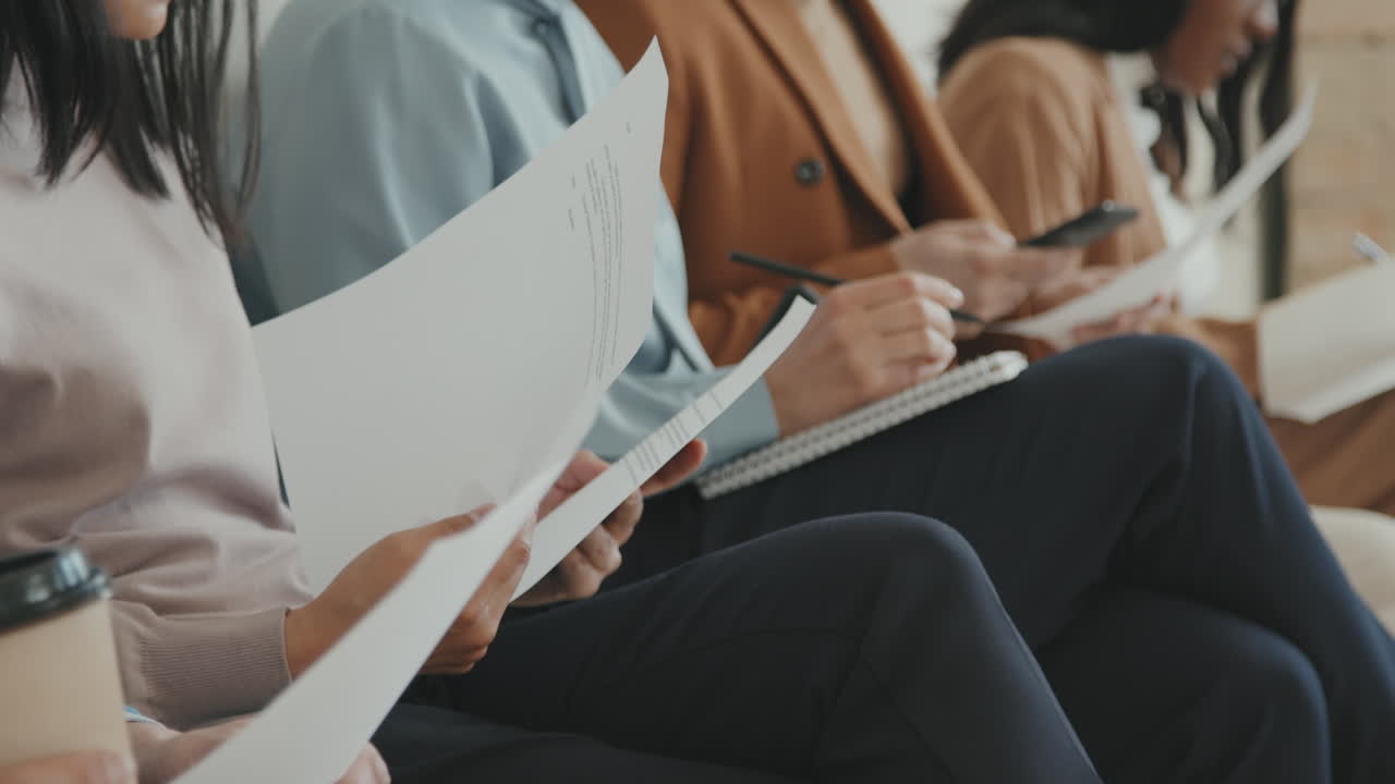 Unrecognizable Job Applicants Waiting