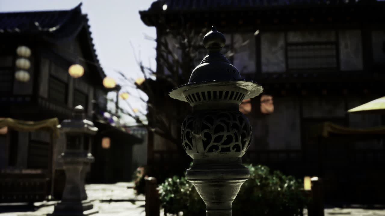 Lantern illuminates tranquil courtyard at historic japanese location