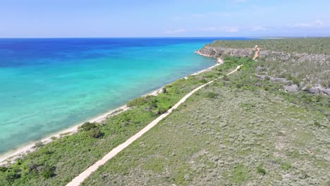 Coastal-Road-Along-The-Beach-In-Bahia-de-Las-Aguilas-In-Pedernales,-Dominican-Republic