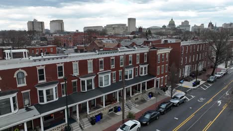 aerial rising shot of city homes in harrisburg, pa