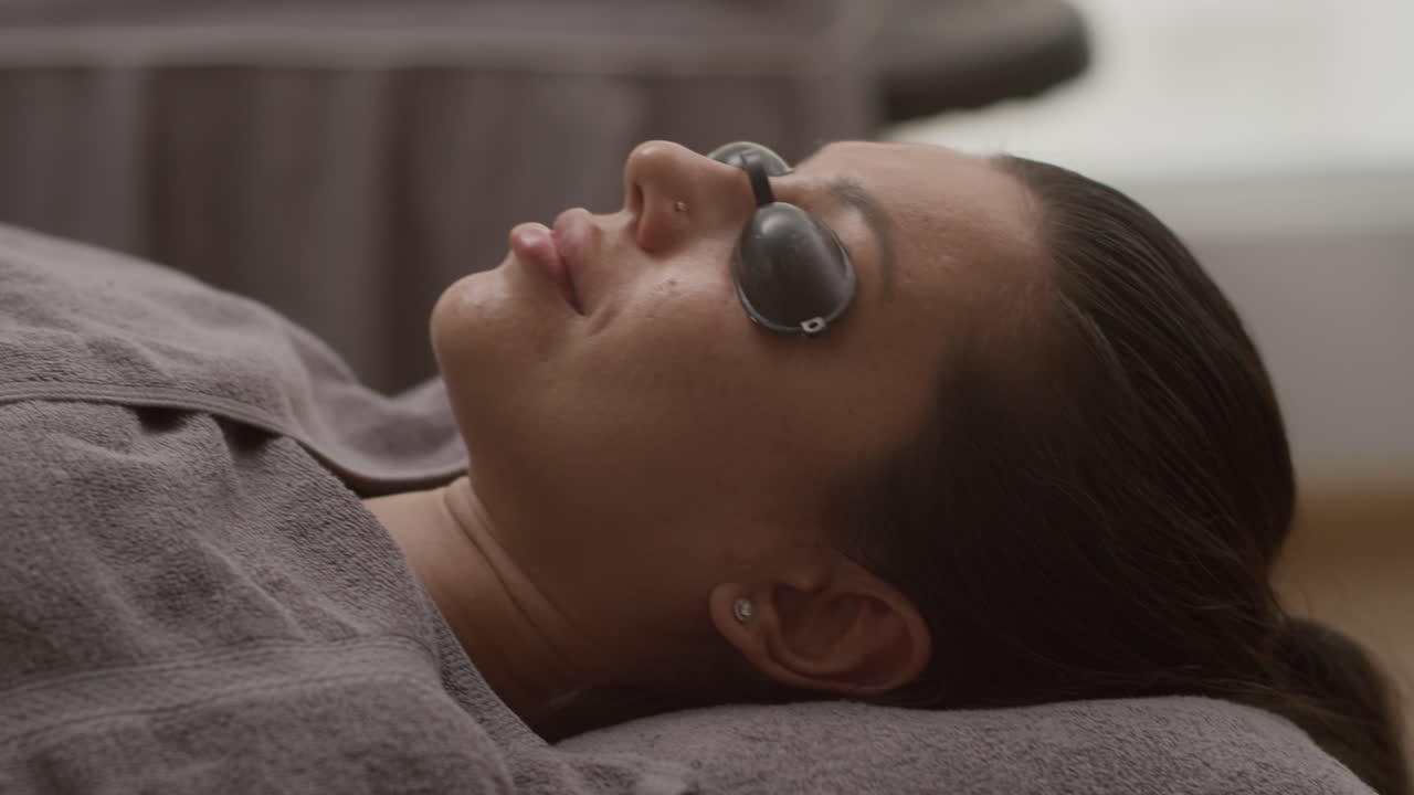 Caucasian Woman Getting Arms Gelled during Photoepilation Procedure