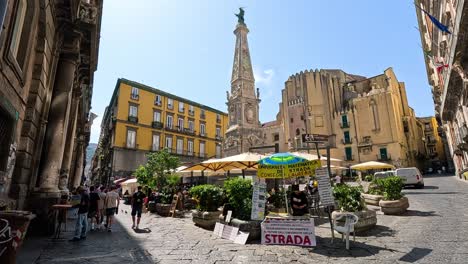 busy street with people and historic buildings