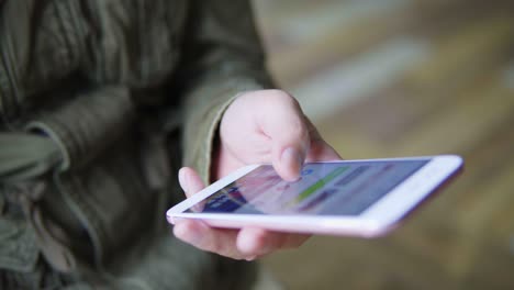 man using smartphone on metro station