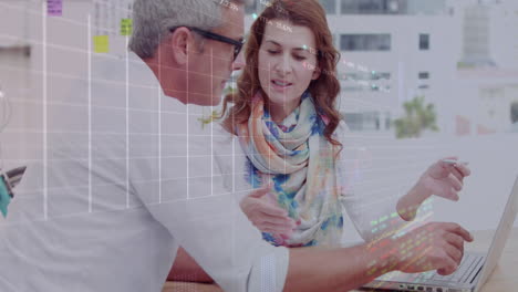 Animation-of-statistical-data-processing-over-diverse-man-and-woman-discussing-over-laptop-at-a-cafe