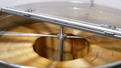 honey extractor in operation