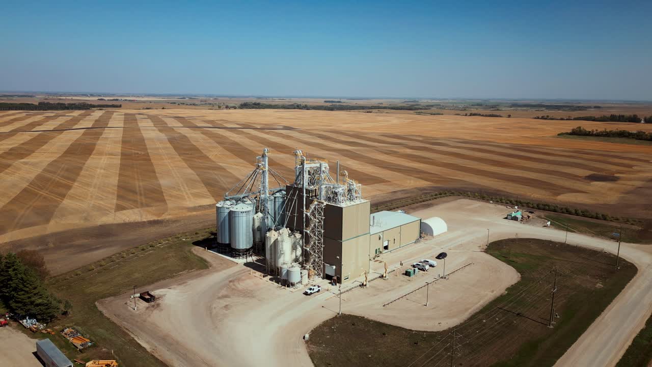 4K Drone Descending Shot of a Farm Grain Elevator Business in the Midwest