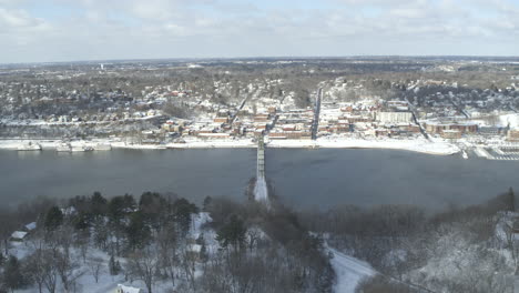 aerial view of stillwater lift bridge and river in winter