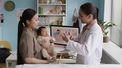 mother and baby at doctor's clinic