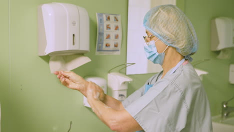 nurse washing hands in a hospital