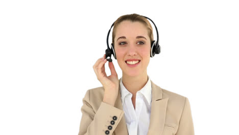 smiling call centre agent talking on the headset