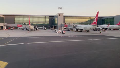 taxing at the istambul havalimani international airport on sunset