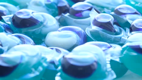 blue capsules for washing clothes in an automatic machine the concept of washing clothes